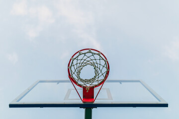 basketball hoop on the background of the forest in the evening