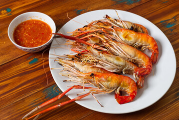 Roasted, Grilled Prawn on the Wood Table, Fresh Seafood shrimp Tasty Meal.