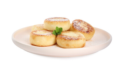 Obraz na płótnie Canvas Delicious cottage cheese pancakes with mint and icing sugar isolated on white