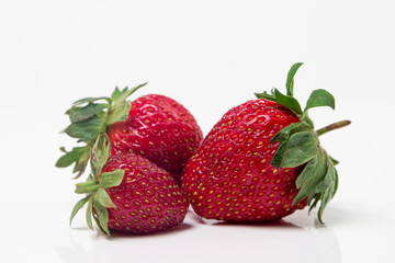 Strawberries on a white background. Fresh ripe strawberries. Healthy diet.