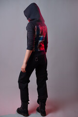 Kitsch style, fashion of the future. mixing styles. A young woman