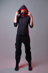 Kitsch style, fashion of the future. mixing styles. A young woman