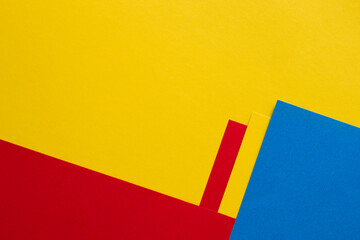 Yellow, red, blue abstract background with copy space