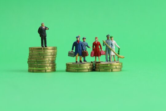 Figuren auf Euro M&uuml;nzen steht f&uuml;r Verteilung von Reichtum 