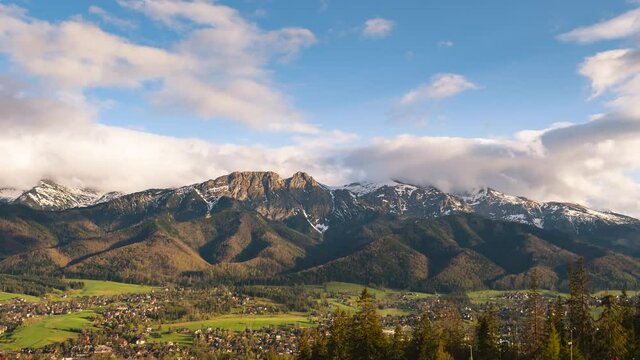 Sunset in the Tatras. In the Zakopane valley. View of the top of Giewont. 4k. Timelapse.