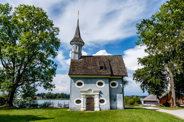 Fototapeta na wymiar Exterior of the Seekapelle zum Hl. Kreuz at Herrenchiemsee - Herren island - Bavaria, Germany, Europe
