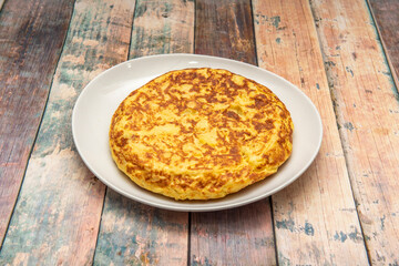 Appetizing Spanish potato omelette made in Spanish tapas bar