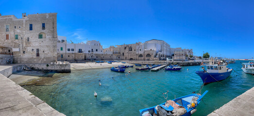 Boats moored at the Porto Antico in the old town of Monopoli, Puglia, Italy