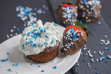 macro photo of chocolate covered strawberries with blue sprinkles