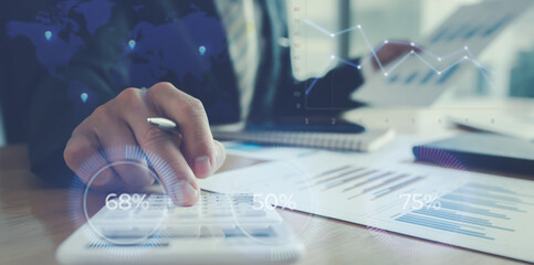 Financial Businessman analyze the graph of the company's performance to create profits and growth,...