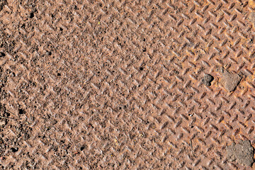 Background of rusted metal diamondplate pattern metal, horizontal aspect