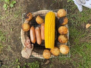 炭焼き焼肉（とうもろこし、ウインナー、たこ焼き、豚肉）