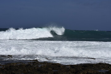 the waves of the sea demonstrate their power