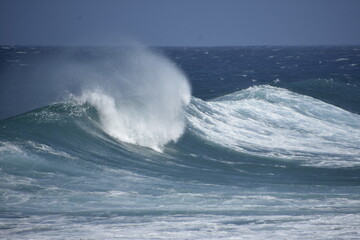 the waves of the sea demonstrate their power