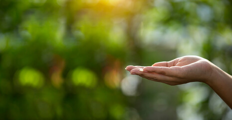 Technology, hand holding with environment Icons over the Network connection on green background.