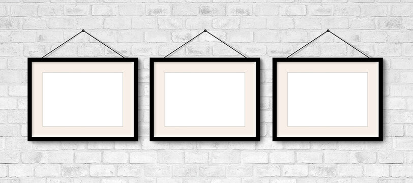 Three Horizontal Frames On White Brick Wall. 3 Picture Frame Empty Blank with Black borders Hanging in Grey Bricks Background. Professional design Mockup. 3D Visualization 