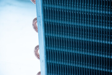 Close up aluminum fin of cooling condenser coil of air condition system. Pattern for abstract background.