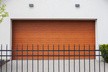 Closeup shot of brown sectional garage doors for cars