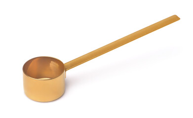 Empty golden coffee measuring spoon
