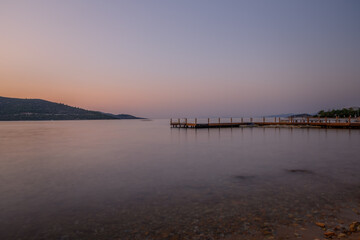 sunset over bay in Aegean sea. Torba, Bodrum, Turkey. October 2020. Long exposure picture