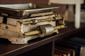 Old classic vintage scale on wooden table