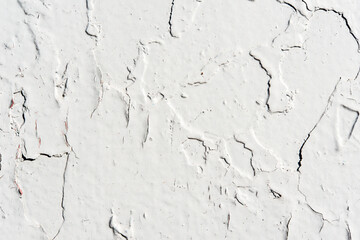 White wall with cracked paint
