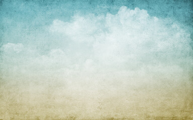 Vintage background with clouds. Handmade textured backdrop. Blue and yellow shade. Old paper texture. Aged wallpaper for card. Poster. Grunge template for design. Watercolor texture.