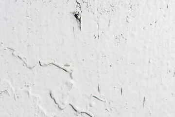 White wall with cracked paint