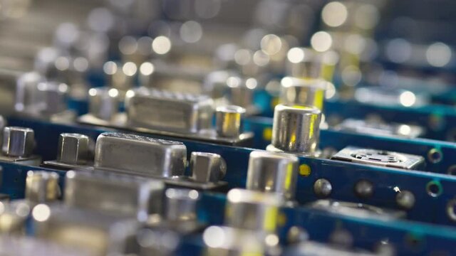 Close-up blurry metal sockets on a computer video board