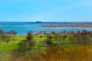 A distance  view of Jones Beach from Norman J. Levy Park and Preserve, Merrick, New York