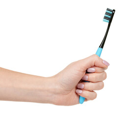 Hand with blue dental toothbrush isolated on white background