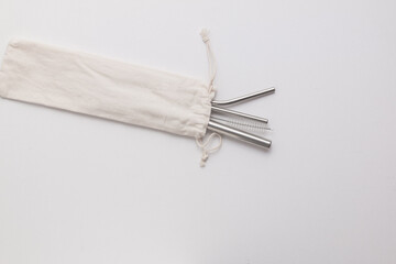 Metallic straws in a bag