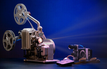 Old retro movie projector, still life in dark colors