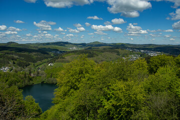 Fototapeta na wymiar The view from the Dronketurm to the Gemündener Maar and Daun