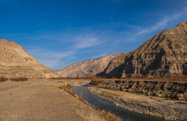 Tortum Valley and Tortum stream with mountains on background in Erzurum region, Turkey. January 2021