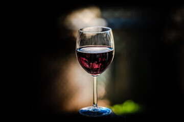 Wine class in the black background 