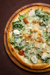 pizza with egg and green vegetarian salad.