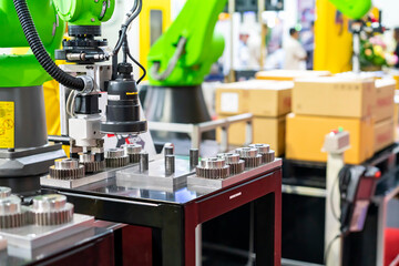 high technology and precision robot grip with camera and automatic clamp or chuck for vision inspection detect sorting and catch metal gear product move or assembly in manufacturing process