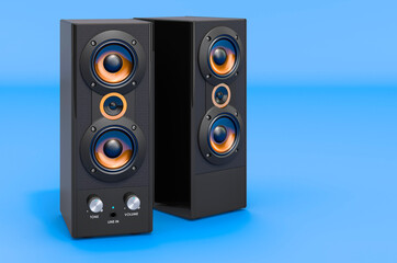 Bookshelf Speakers on blue backdrop, 3D rendering