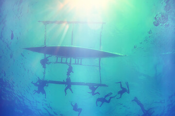 Naklejka premium sun rays scuba reef / blue sea, abstract background, sunny day, rays in water