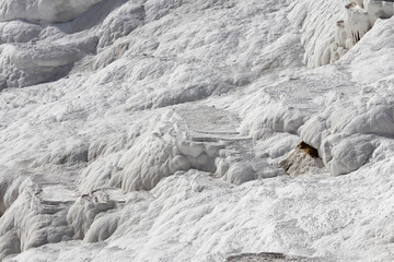 white magic in Pamukkale - limestone travertine formations pools with mineral water from hot springs