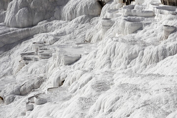 white magic in Pamukkale - limestone travertine formations pools with mineral water from hot springs