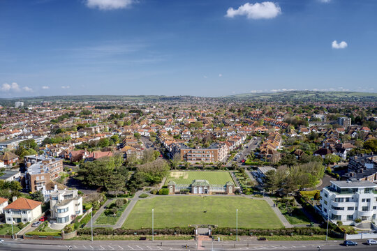 Worthing Marine Gardens and Winchelsea Garden on the seafront of West Worthing in West Sussex. Aerial view.