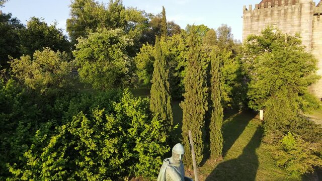 people walking in the park near the castle