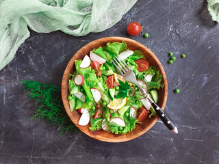 salad in a plate on a concrete background