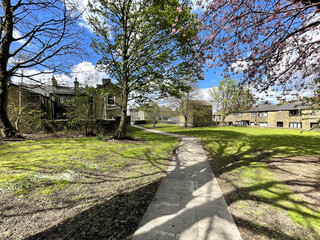 Small park area with a footpath, next to, Green End, in the village of, Clayton, Bradford, UK