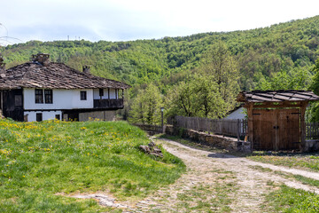 Typical street and old houses at historical village of Bozhentsi,  Bulgaria