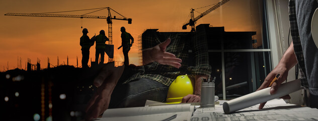 Double exposure of civil engineer silhouette at construction site with building designer meeting at...