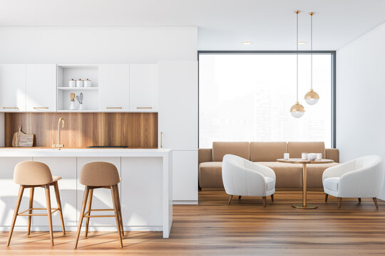 White living room and kitchen interior