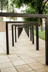 Metal frames for parking bicycles in a city park